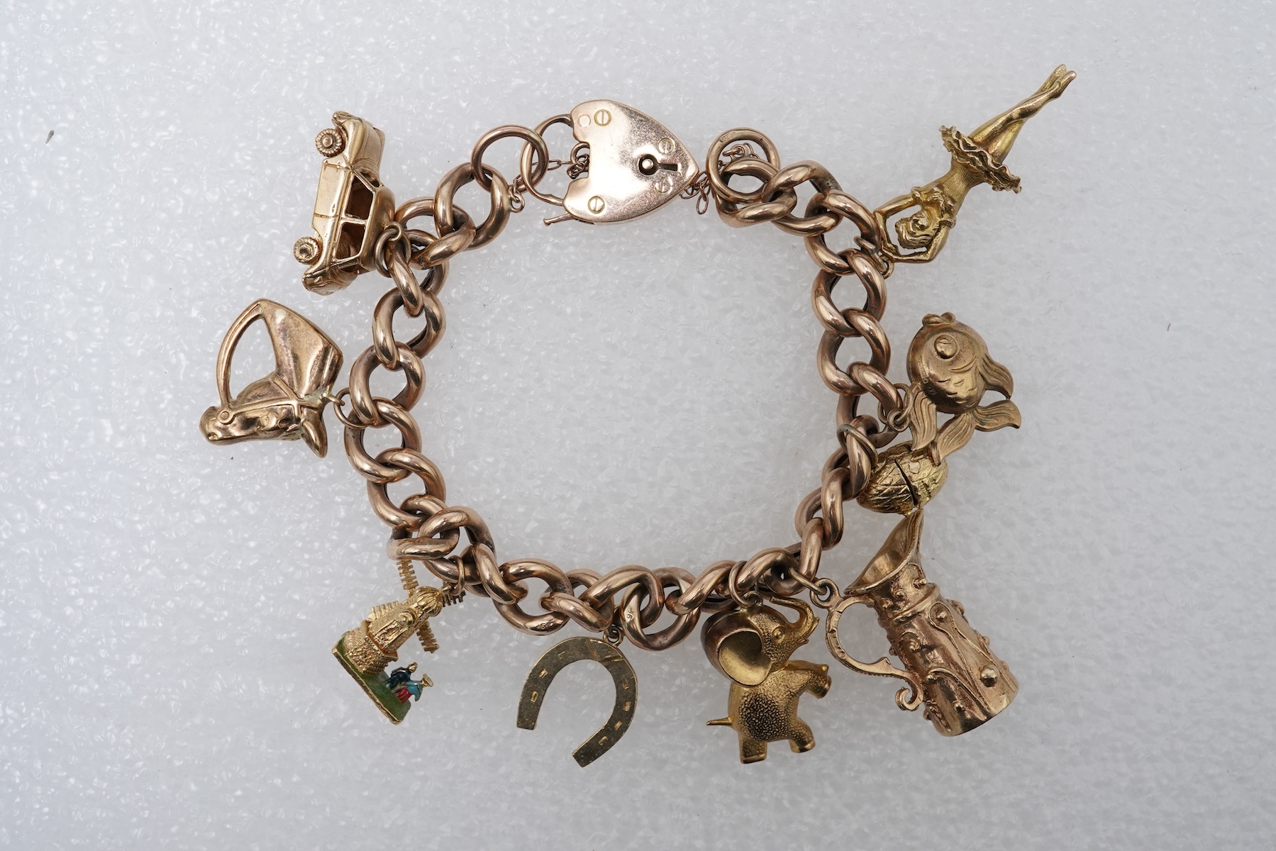 A 9ct gold charm bracelet